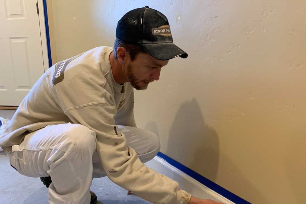 Pinon Painter doing prep work before an interior house painting job in Prescott Arizona